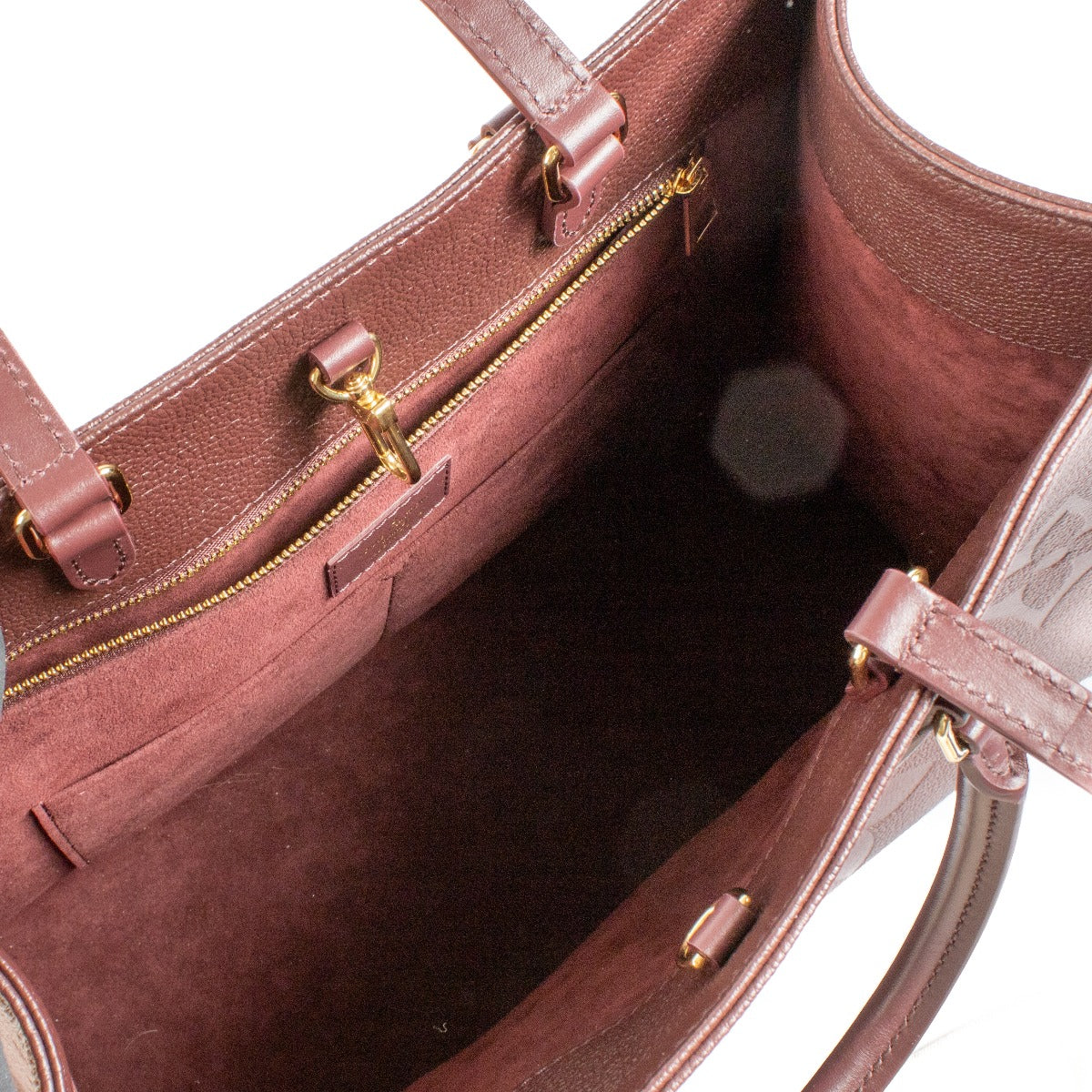 Louis Vuitton Wijn Monogram Empreinte Onthego MM Tas