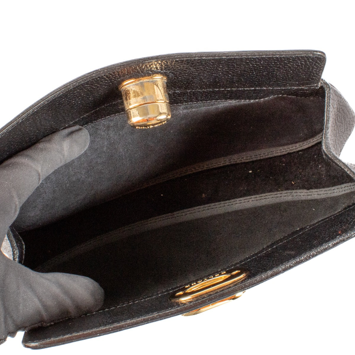 shop 100% authentic second hand Delvaux Vintage Black Leather Turnlock Clutch on Labellov.com
