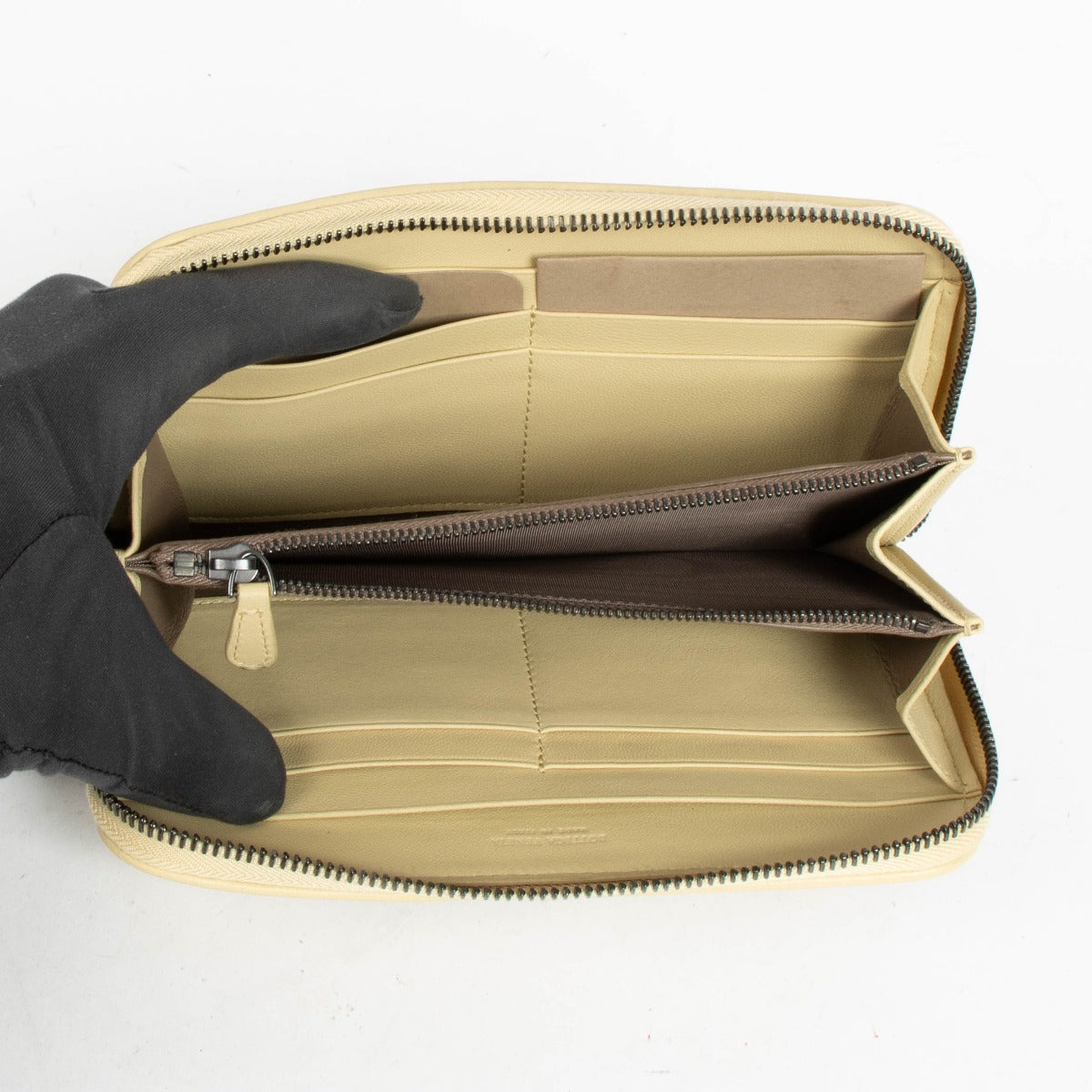 Shop this authentic Bottega Veneta Beige Intrecciato Zip Around pre-loved on Labellov.com