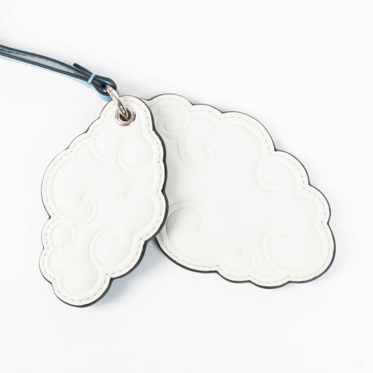 Authentic pre-loved Delvaux Blue 2015 Rene Magritte Cloud Bag Charm on Labellov.com