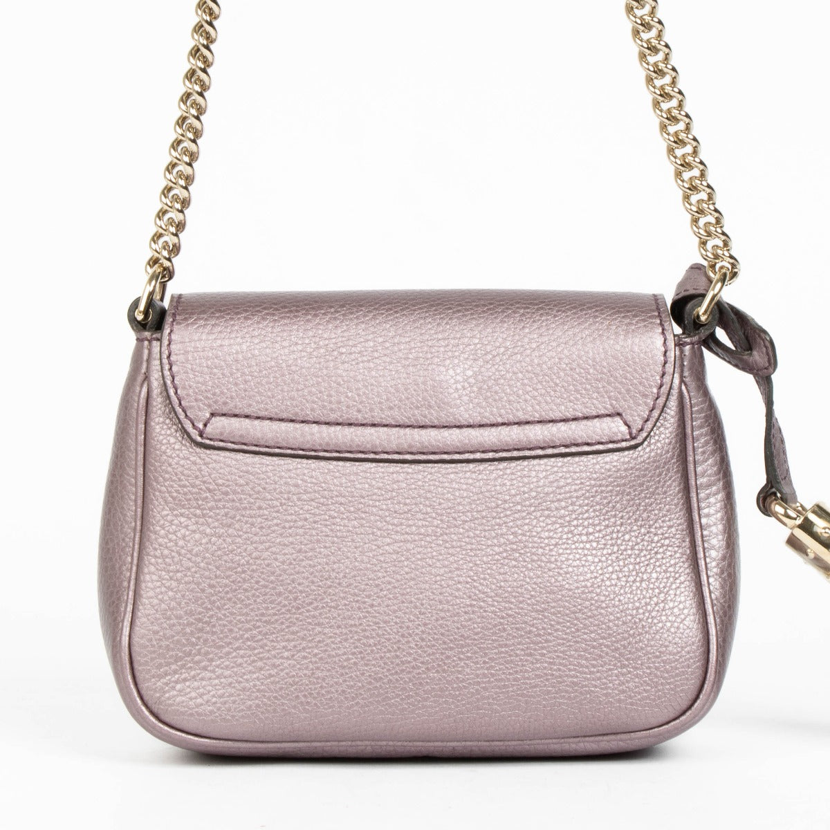 Shop this authentic Gucci Metallic Purple Soho Crossbody Bag pre-loved on Labellov.com