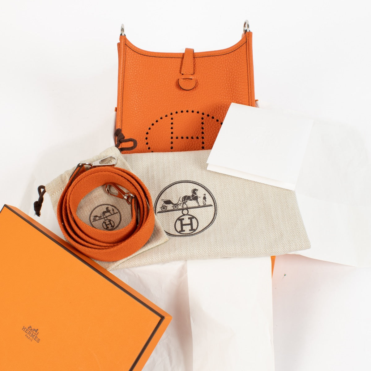 shop 100% authentic second hand Hermès Evelyne 16 Orange Clemence PHW on Labellov.com