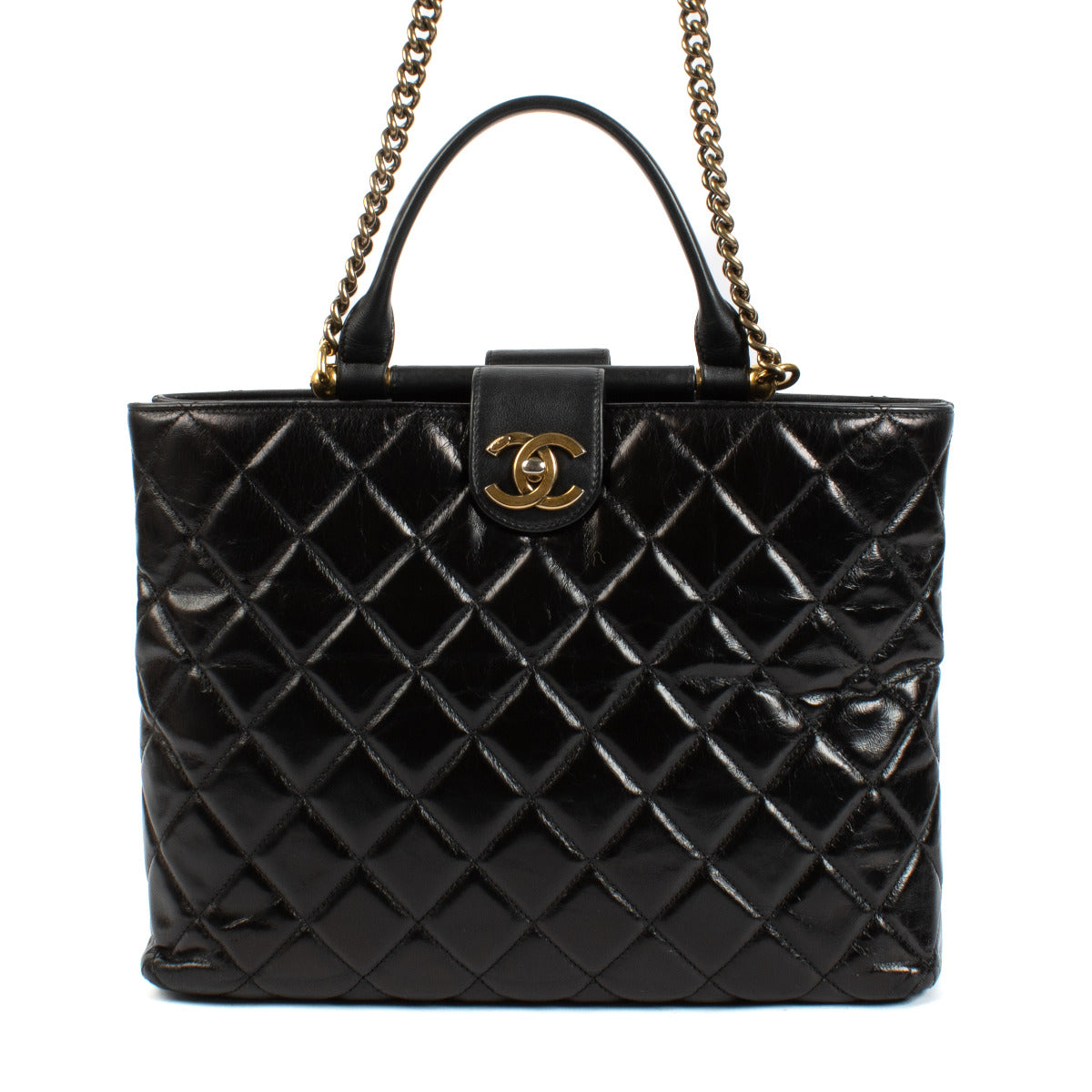 Sac cabas Chanel en veau glacé matelassé avec barre dorée