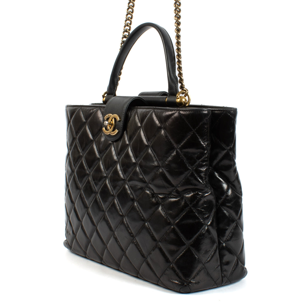 Sac cabas Chanel en veau glacé matelassé avec barre dorée