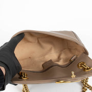 Authentic pre-loved Gucci Beige Small GG Marmont Shoulder Bag on Labellov.com