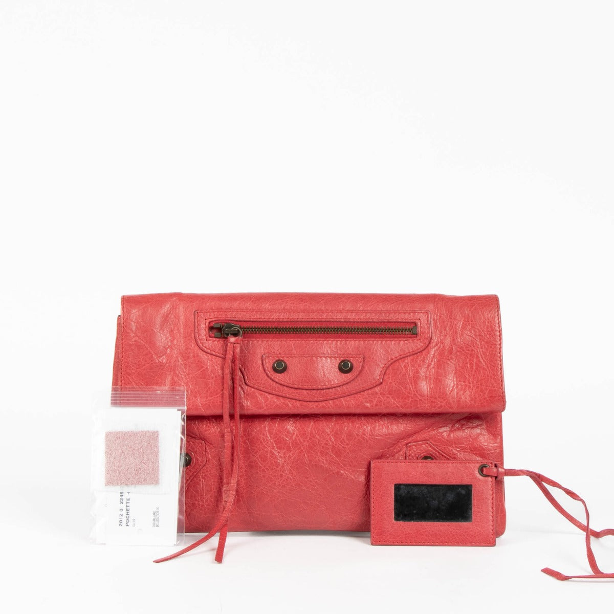 Shop this 100% authentic Balenciaga Rose Thulian Lambskin Motocross Classic Envelope Clutch at Labellov.com