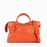Shop this 100% authentic Balenciaga Vermillon Lambskin Motocross City Giant 12 Satchel Bag at Labellov.com