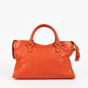 Shop this 100% authentic Balenciaga Vermillon Lambskin Motocross City Giant 12 Satchel Bag at Labellov.com