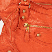 Shop this 100% authentic Balenciaga Vermillon Lambskin Motocross City Giant 12 Satchel Bag at Labellov.com