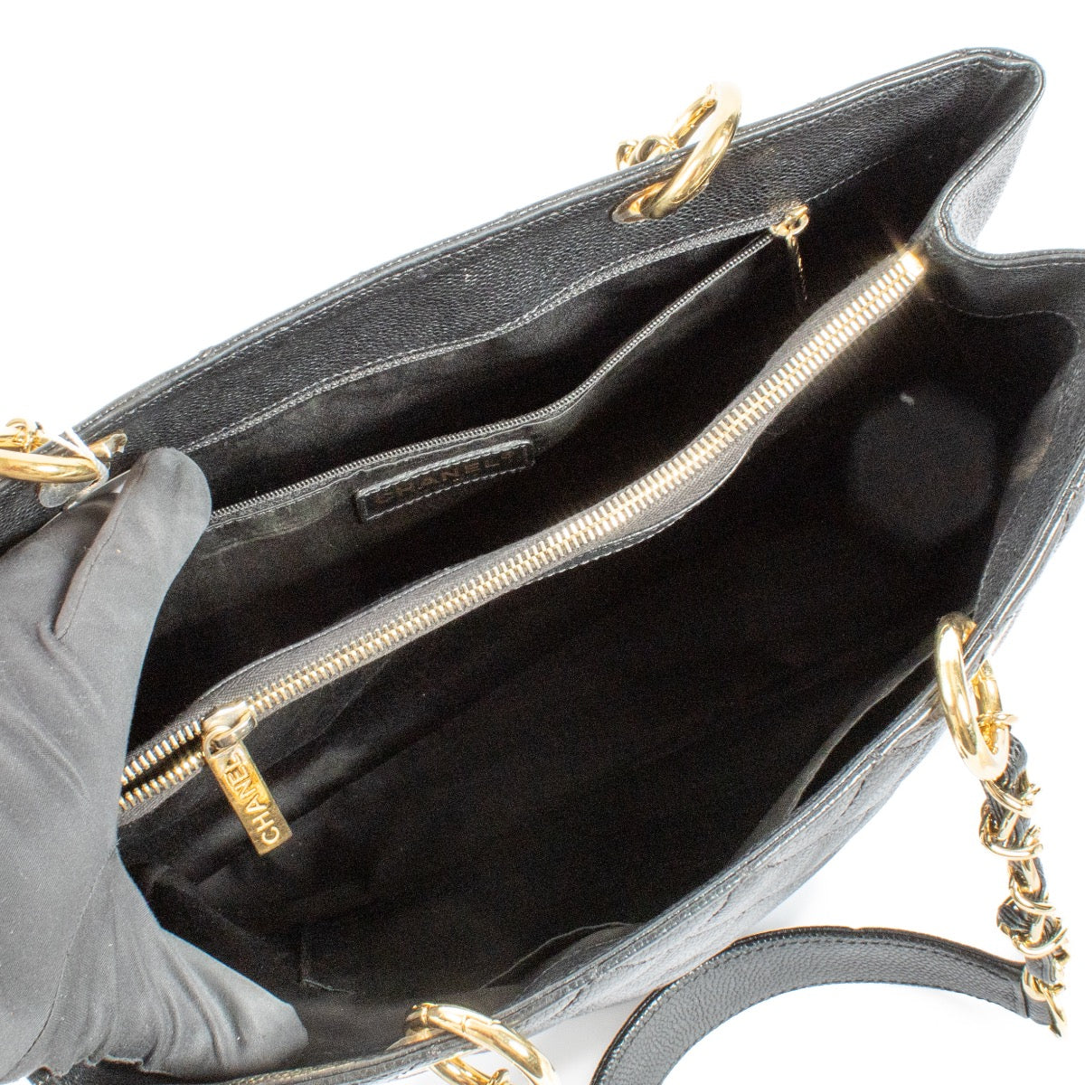 Buy authentic preloved Chanel Black Caviar Leather Grand Shopping Tote on Labellov.com