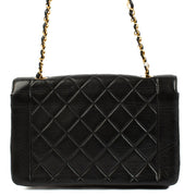 Shop the Chanel Black Lambskin Medium Diana Flap Crossbody with gold hardware at Labellov, a luxurious and timeless piece for any occasion.