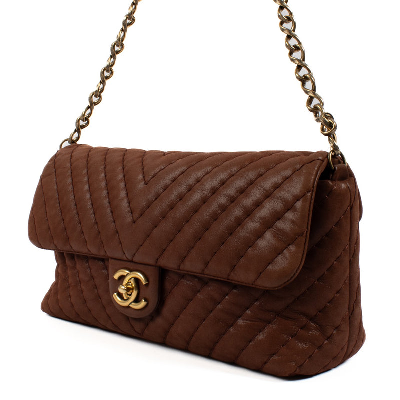 shop 100% authentic second hand Chanel Brown Shimmer Chevron Classic Flap Bag on Labellov.com