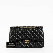 Shop this 100% authentic Chanel Black Lambskin Large/Jumbo Classic Double Flap Bag at Labellov.com