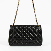Shop this 100% authentic Chanel Black Lambskin Large/Jumbo Classic Double Flap Bag at Labellov.com