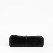 Shop this 100% authentic Chanel Black Lambskin Large/Jumbo Classic Double Flap Bag at Labellov.com