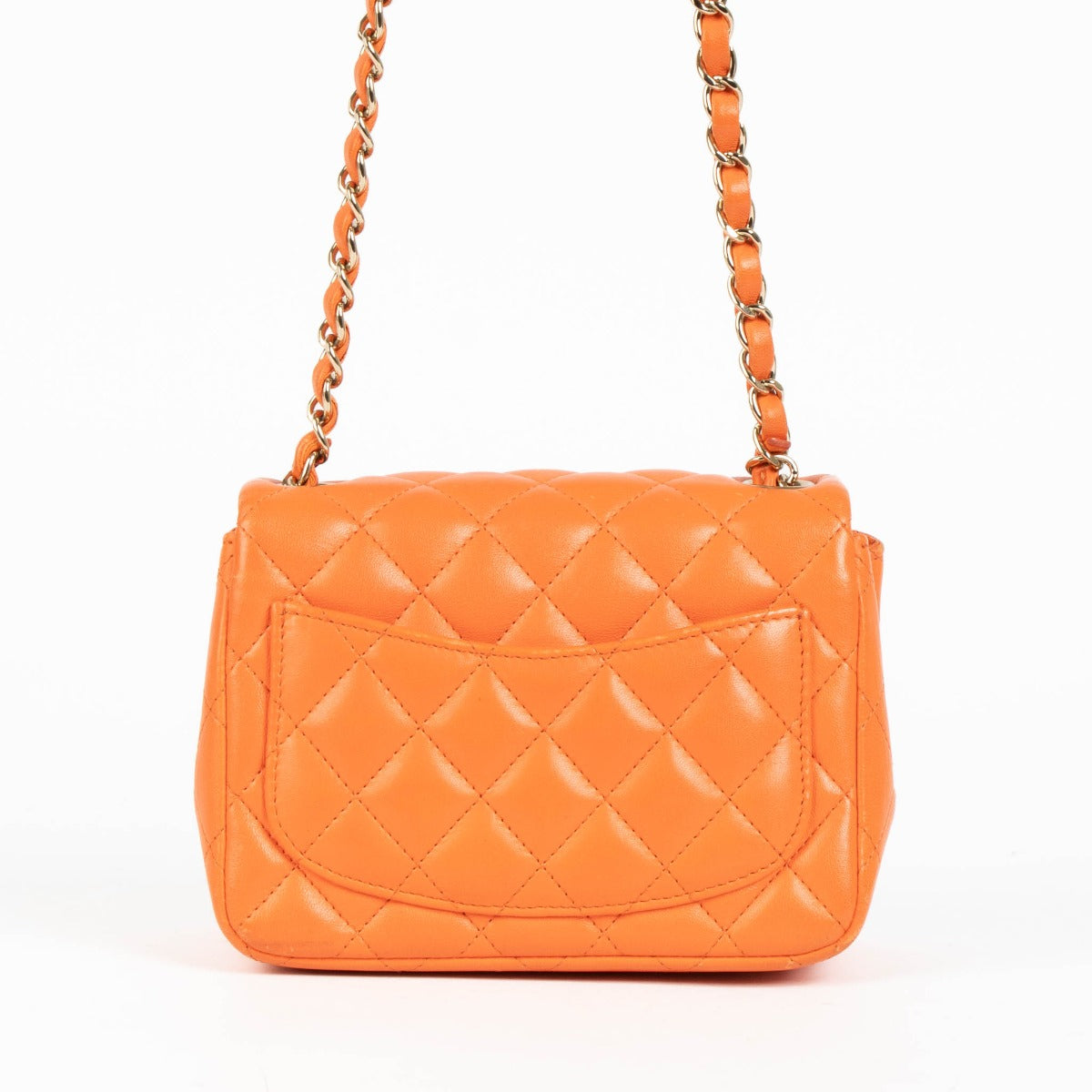 Shop this 100% authentic Chanel Orange Lambskin Mini Square Classic Bag at Labellov.com