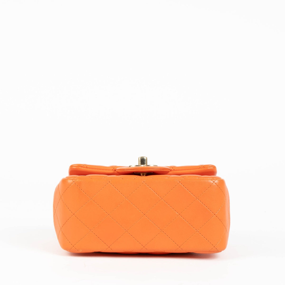 Shop this 100% authentic Chanel Orange Lambskin Mini Square Classic Bag at Labellov.com