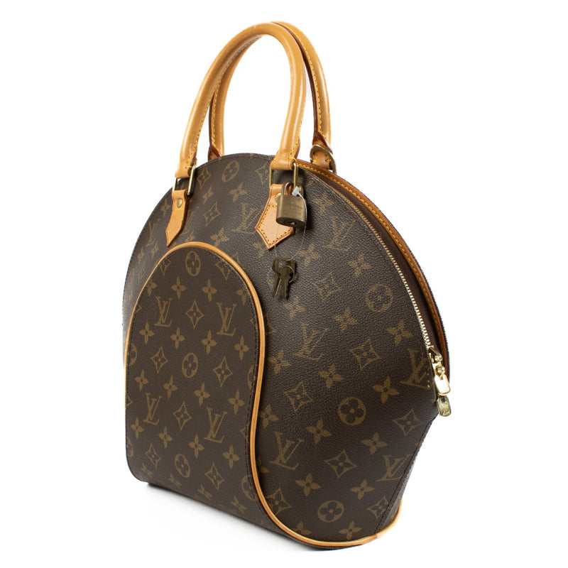 The Louis Vuitton Monogram Ellipse MM Top Handle is a chic and practical handbag with a structured design and spacious interior, perfect for everyday use. Buy now at Labellov.