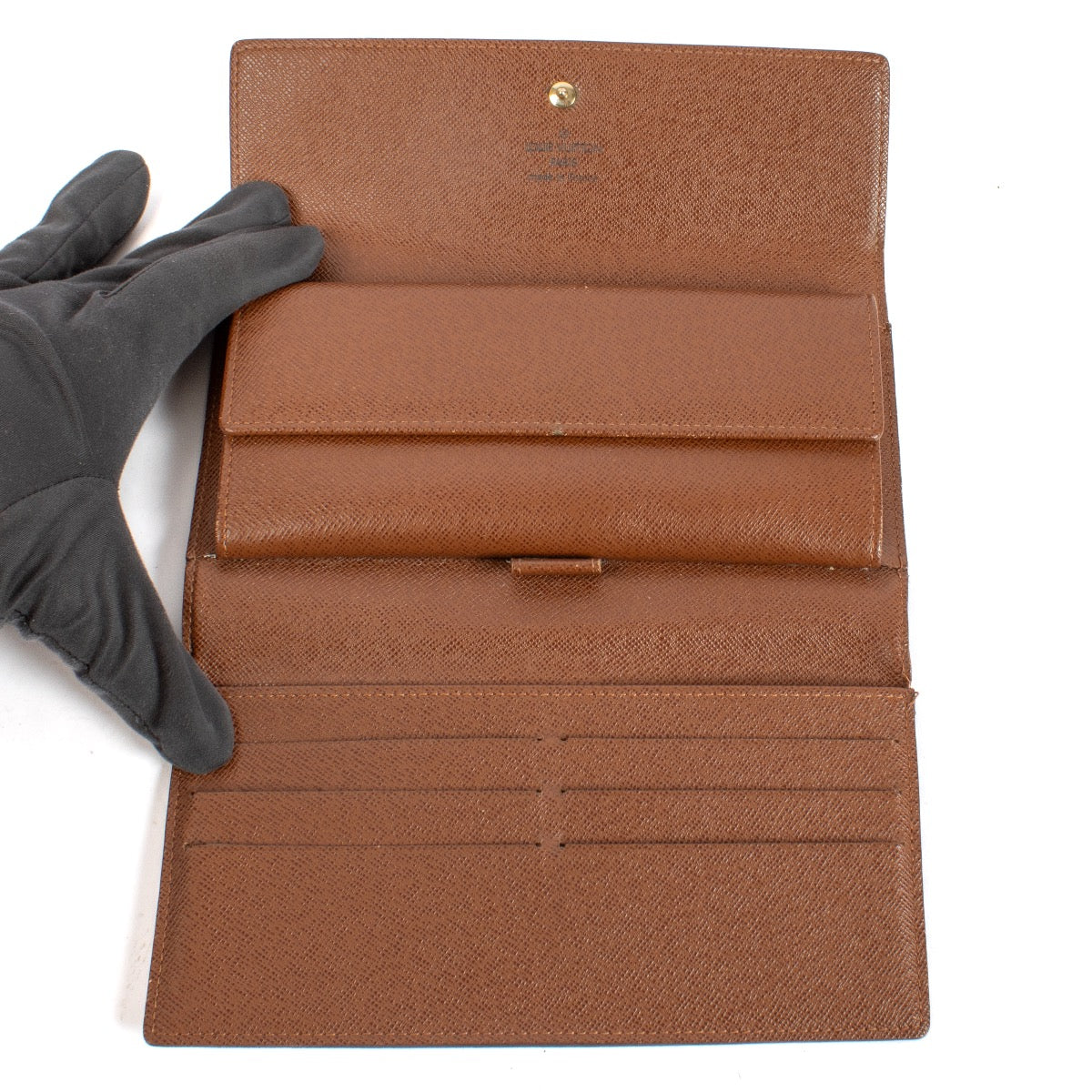 Shop safe online at Labellov in Antwerp and Knokke this 100% authentic second hand Louis Vuitton Monogram Porte Tresor International Long Wallet