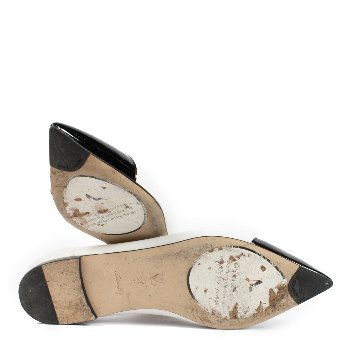 Louis Vuitton White Flats - Size 39, with black toe cap, gold LV logo hardware, minor wear on the upper and sole. Shop now on Labellov.com