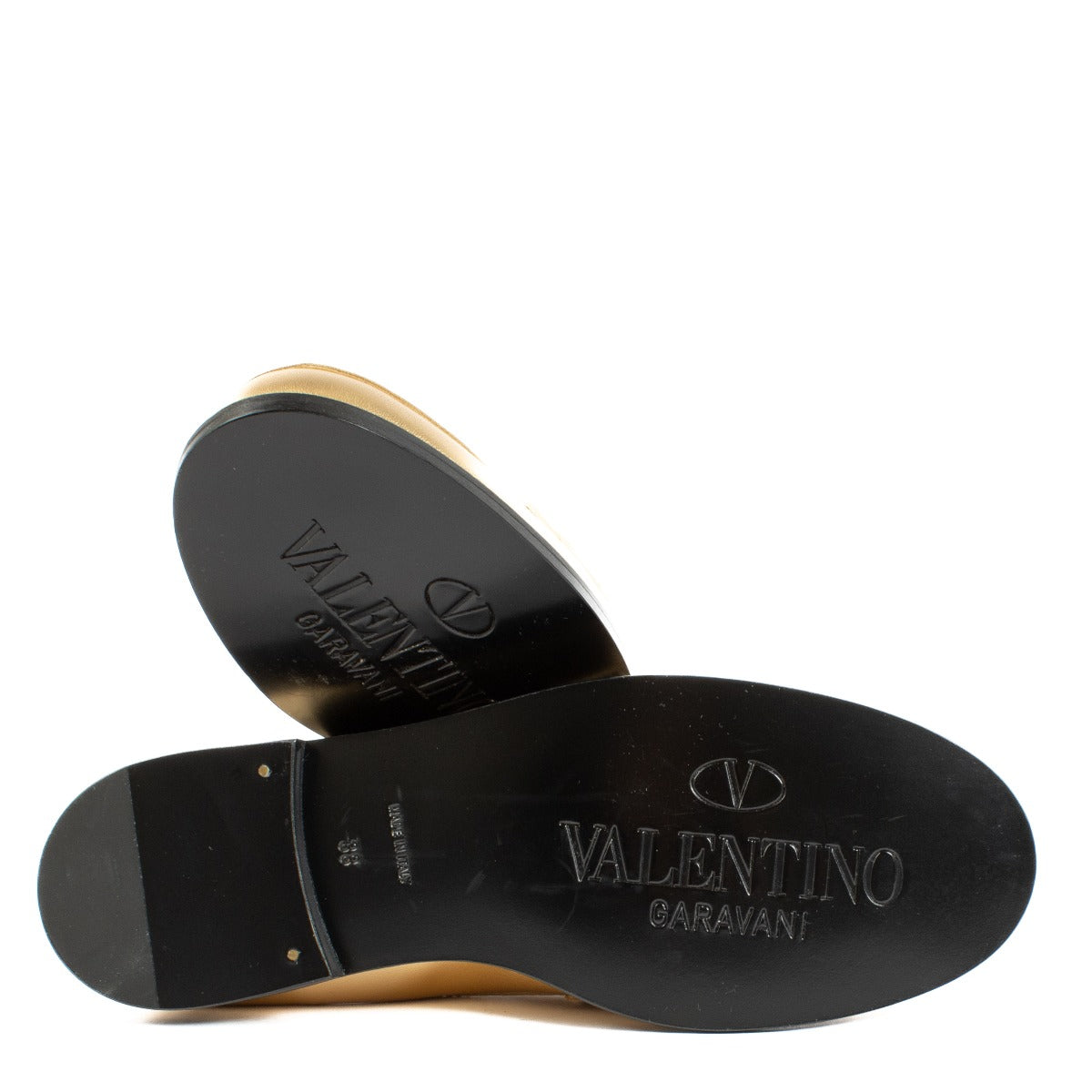 Valentino Garavani Gold Loafers in matte gold, size 38, featuring a sleek design with signature. Shop now on Labellov.com.