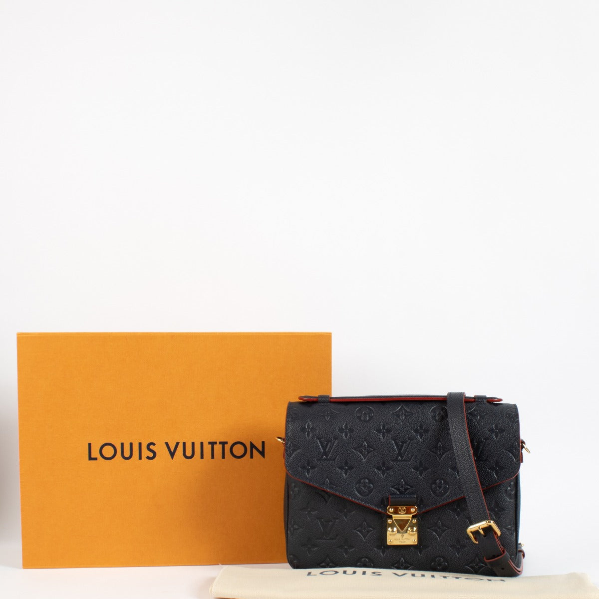 shop 100% authentic second hand Louis Vuitton Navy Monogram Empreinte Leather Pochette Metis on Labellov.com