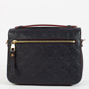 shop 100% authentic second hand Louis Vuitton Navy Monogram Empreinte Leather Pochette Metis on Labellov.com