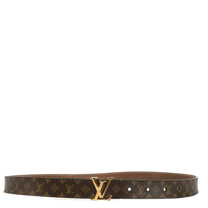 Louis Vuitton Monogram Belt in very good condition, featuring a gold LV logo buckle. Shows signs of use with scratches on the hardware and fading on the inside of the strap. Shop now on Labellov.com