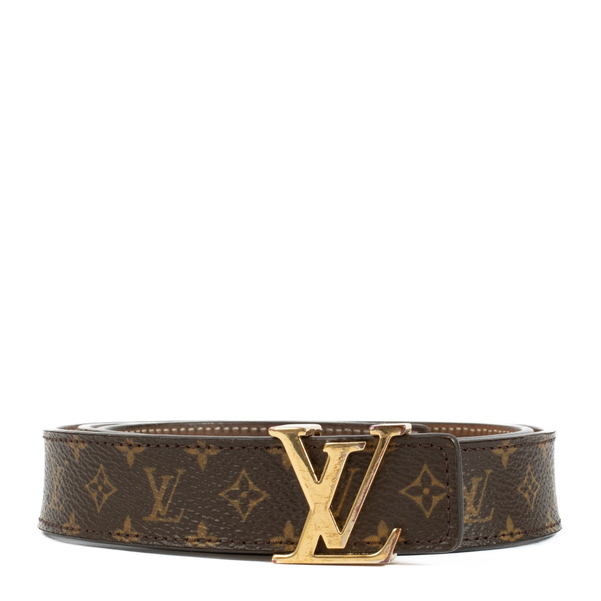 Louis Vuitton Monogram Belt in very good condition, featuring a gold LV logo buckle. Shows signs of use with scratches on the hardware and fading on the inside of the strap. Shop now on Labellov.com