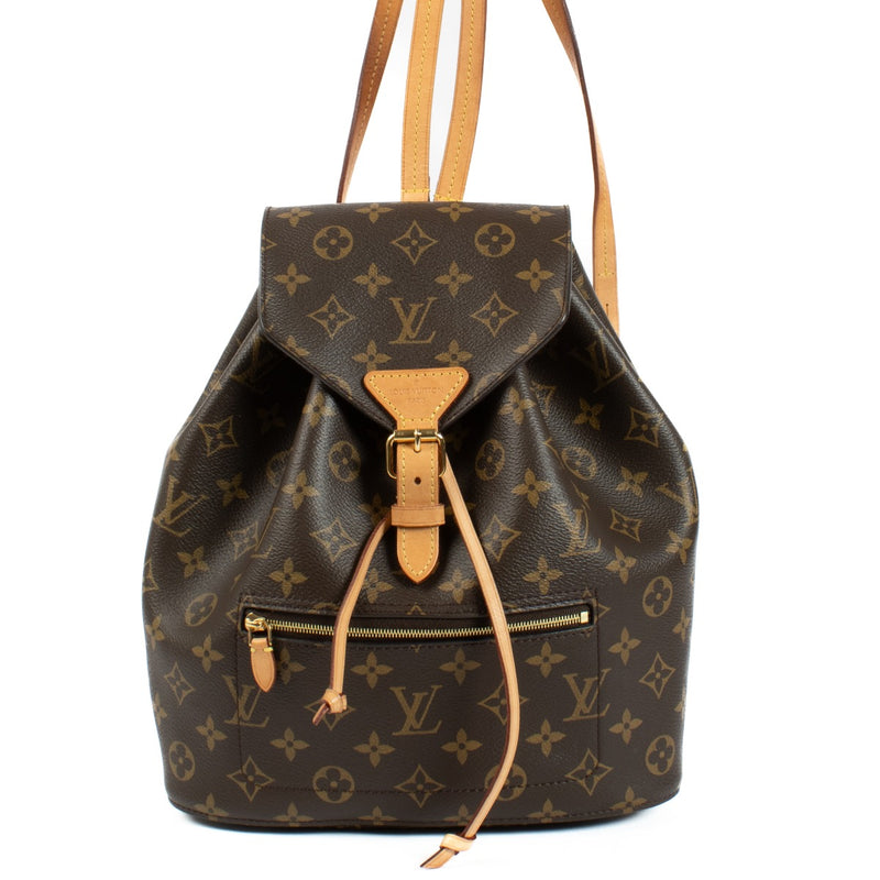 The Louis Vuitton Monogram Montsouris Backpack features the iconic LV monogram canvas with natural leather trim, a drawstring closure with a buckle flap, and adjustable leather straps for comfort. Its spacious interior and front zip pocket offer practical