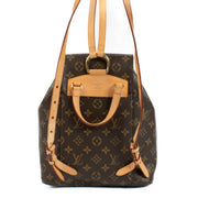 The Louis Vuitton Monogram Montsouris Backpack features the iconic LV monogram canvas with natural leather trim, a drawstring closure with a buckle flap, and adjustable leather straps for comfort. Its spacious interior and front zip pocket offer practical
