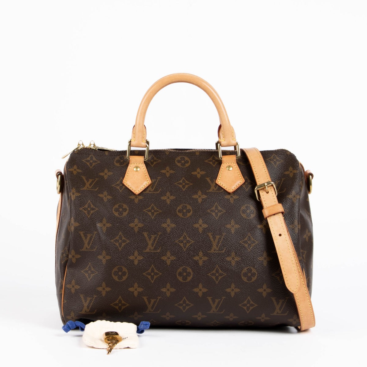 Authentic pre-loved Louis Vuitton Brown Monogram Canvas Speedy Bandoulière 30 Top Handle Bag on Labellov.com