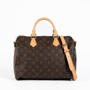 Authentic pre-loved Louis Vuitton Brown Monogram Canvas Speedy Bandoulière 30 Top Handle Bag on Labellov.com