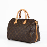 Authentic pre-loved Louis Vuitton Brown Monogram Canvas Speedy Bandoulière 30 Top Handle Bag on Labellov.com