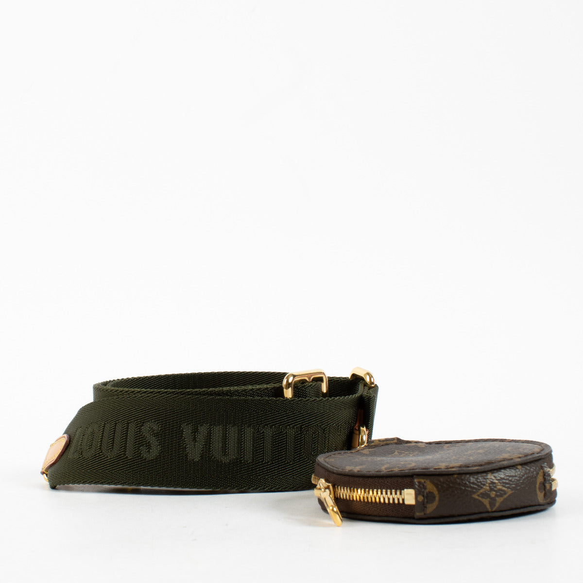 Refresh your Louis Vuitton collection with this iconic Multi Pochette Accessoires Strap—a modern essential for hands-free versatility and street-chic flair. Crafted in durable khaki green jacquard canvas and embossed with the Louis Vuitton signature, this