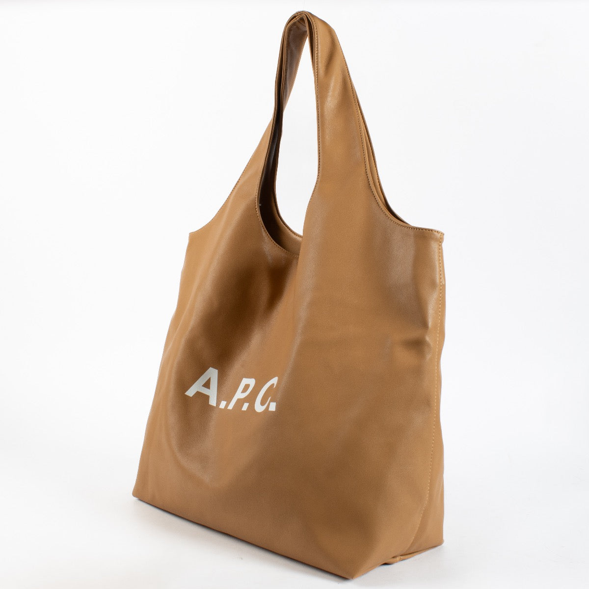 A.P.C. camel leather tote shoulder bag with logo print and soft structure at Labellov.com
