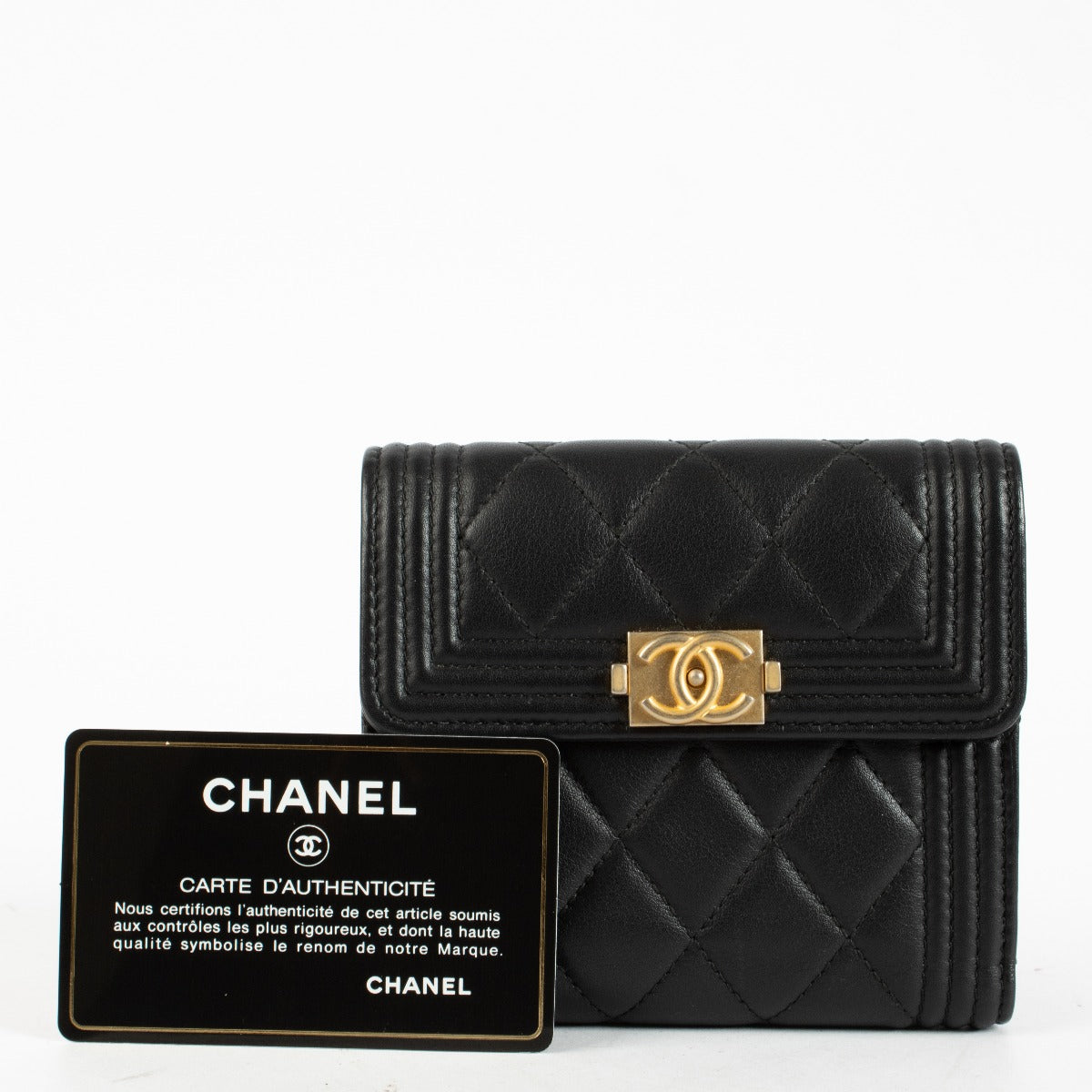 Chanel Black Boy Wallet in quilted leather with gold-tone CC clasp at Labellov.com