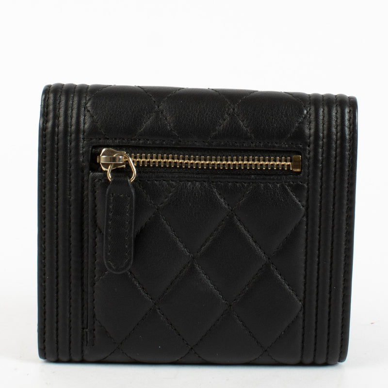Chanel Black Boy Wallet in quilted leather with gold-tone CC clasp at Labellov.com