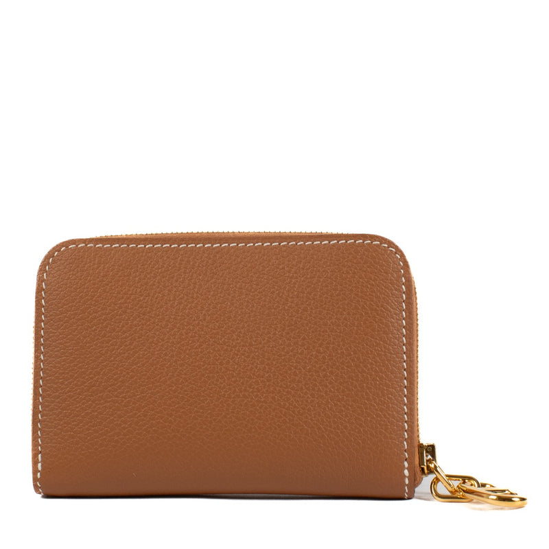 shop 100% authentic second hand Hermès Gold Zipengo Wallet on Labellov.com