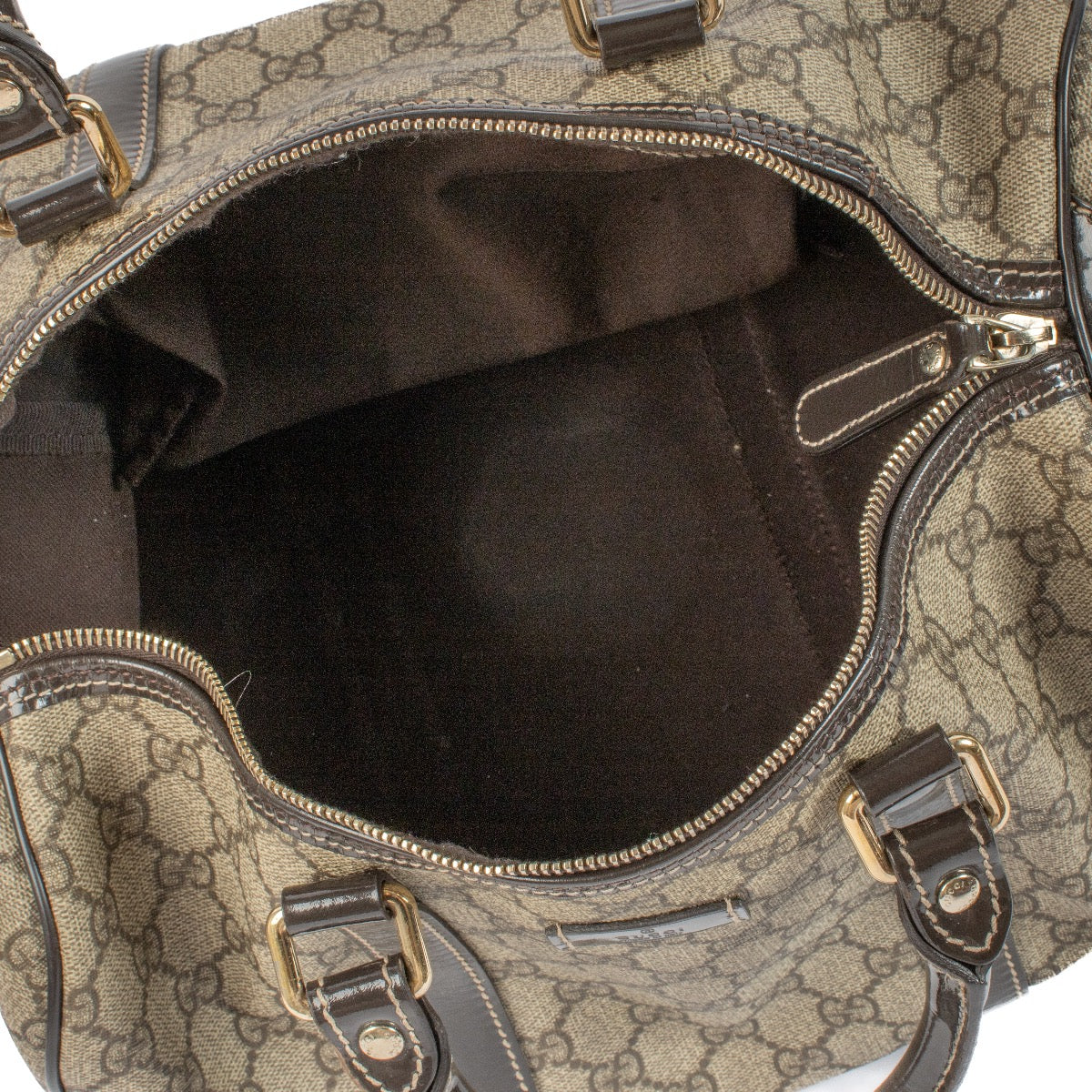 shop 100% authentic second hand Gucci Brown Monogram GG Joy Boston Medium Bag on Labellov.com