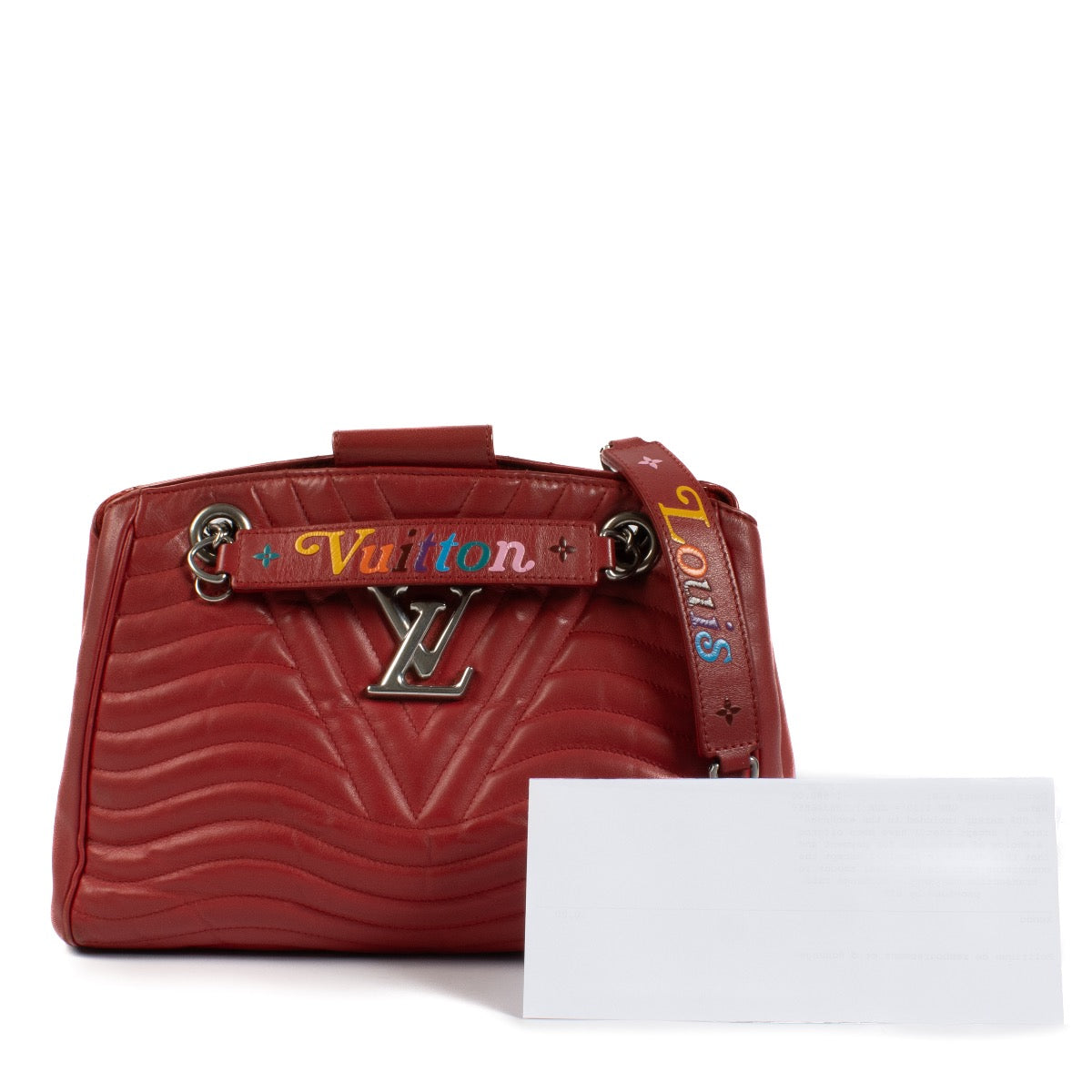 Shop safe online at Labellov in Antwerp, Brussels and Knokke this 100% authentic second hand Louis Vuitton Red New Wave Chain Tote Bag