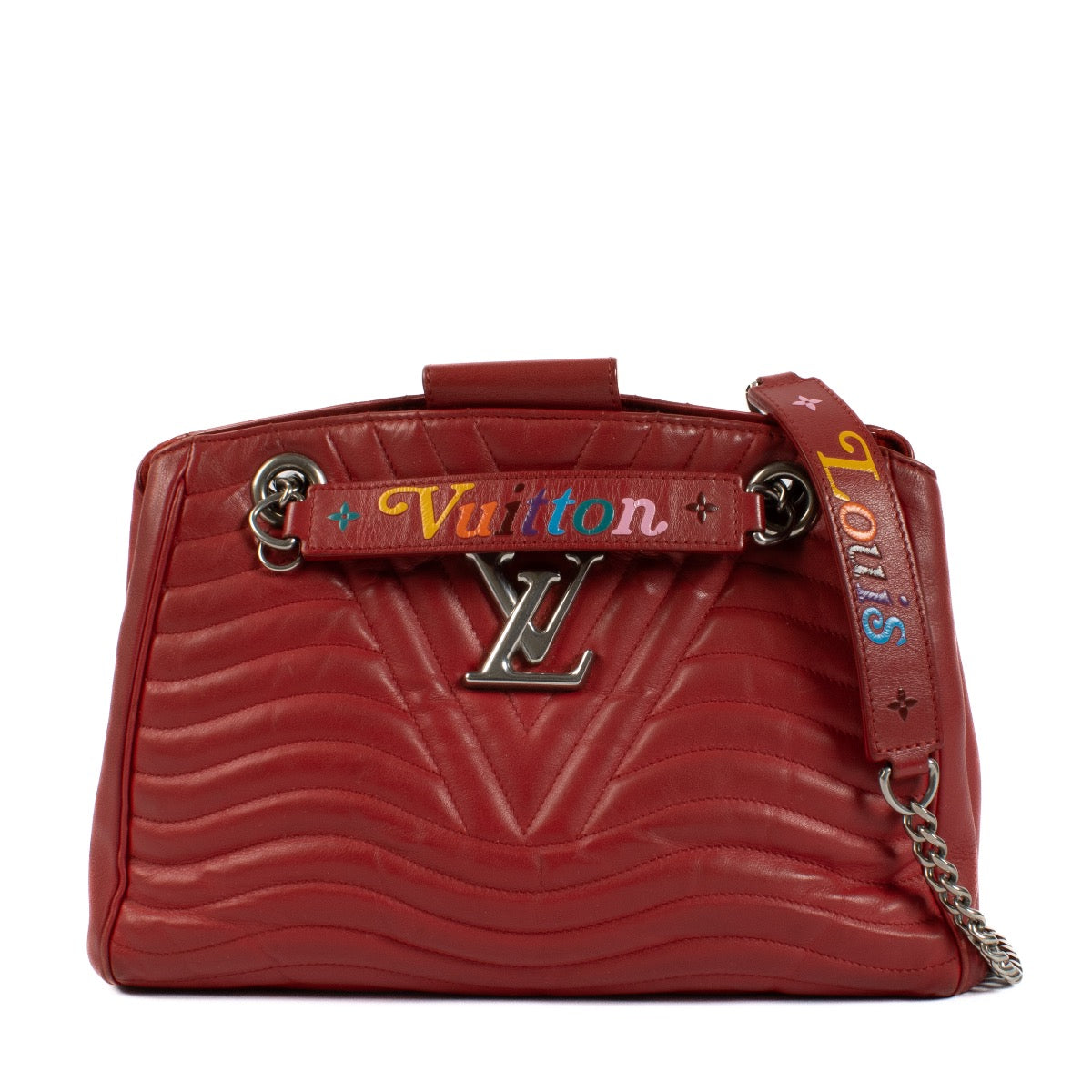 Shop safe online at Labellov in Antwerp, Brussels and Knokke this 100% authentic second hand Louis Vuitton Red New Wave Chain Tote Bag