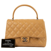 shop 100% authentic second hand Chanel Vintage Beige Caviar Coco Handle Bag on Labellov.com