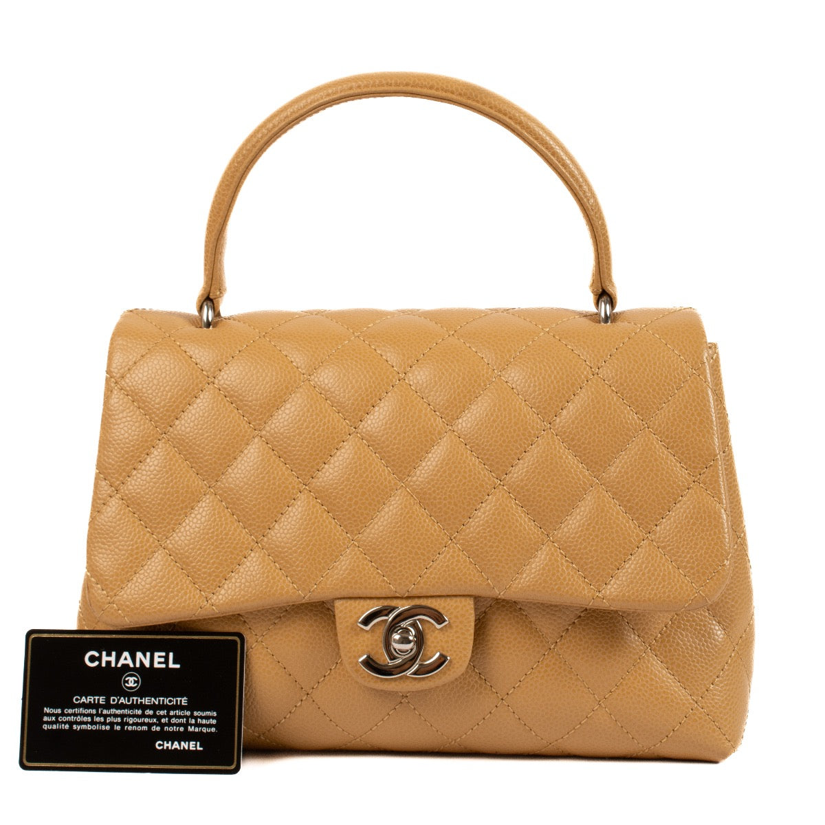 shop 100% authentic second hand Chanel Vintage Beige Caviar Coco Handle Bag on Labellov.com