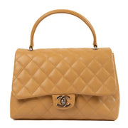 shop 100% authentic second hand Chanel Vintage Beige Caviar Coco Handle Bag on Labellov.com
