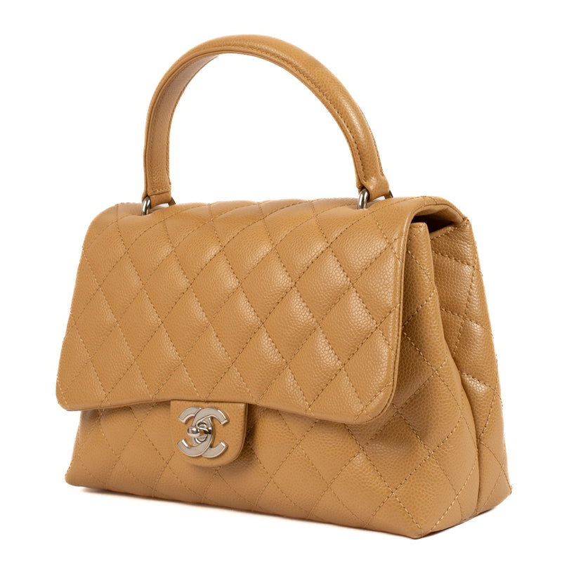 shop 100% authentic second hand Chanel Vintage Beige Caviar Coco Handle Bag on Labellov.com