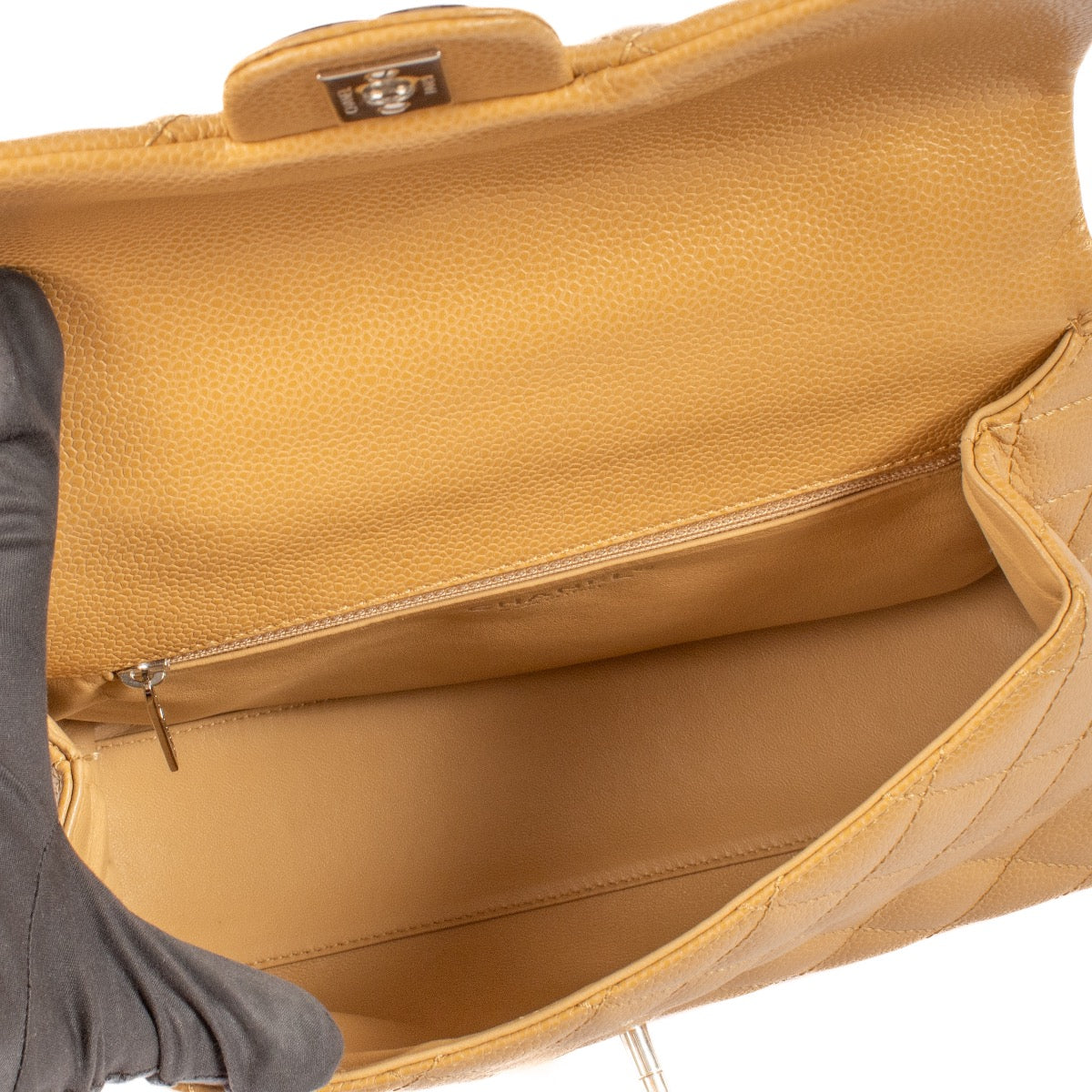 shop 100% authentic second hand Chanel Vintage Beige Caviar Coco Handle Bag on Labellov.com