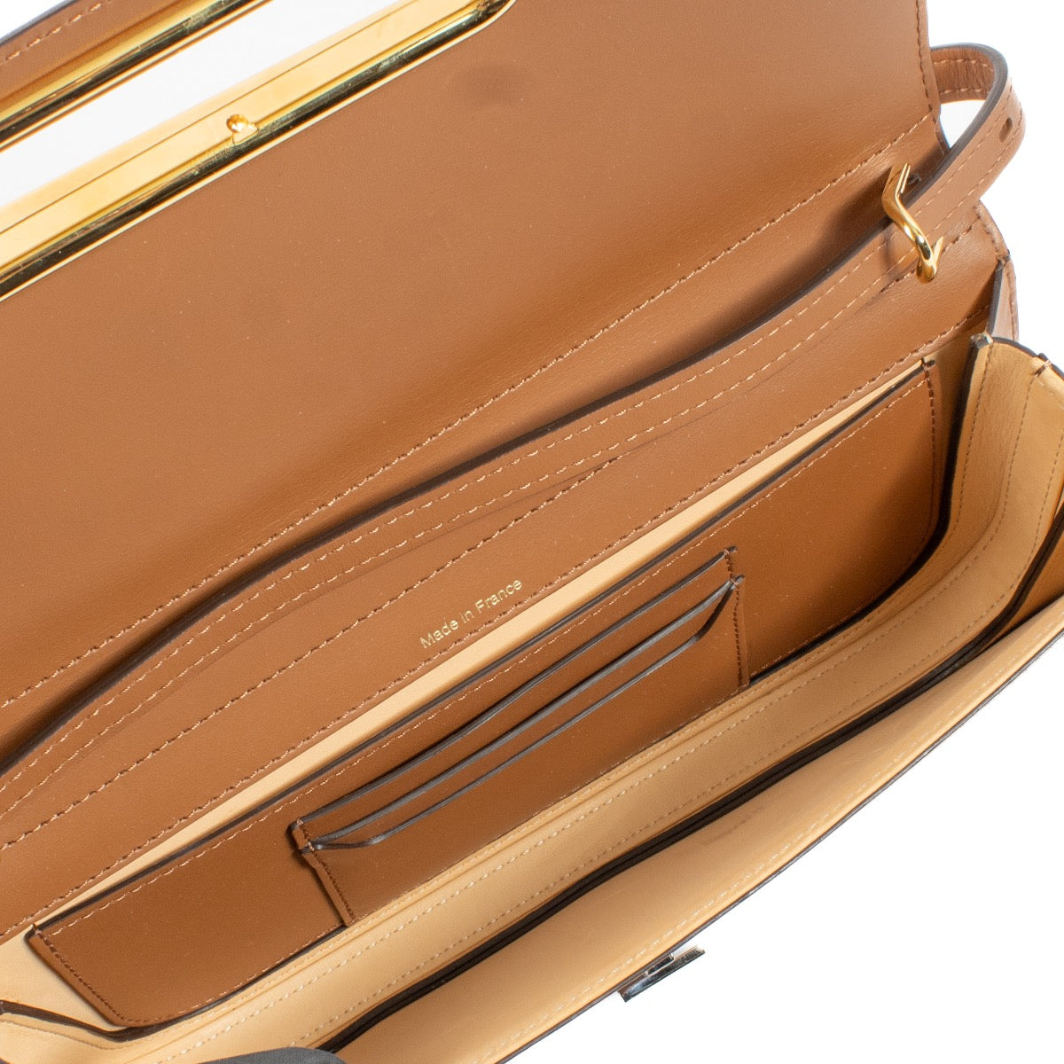 shop 100% authentic second hand Delvaux Tan Olen Calf Lingot Clutch on Labellov.com
