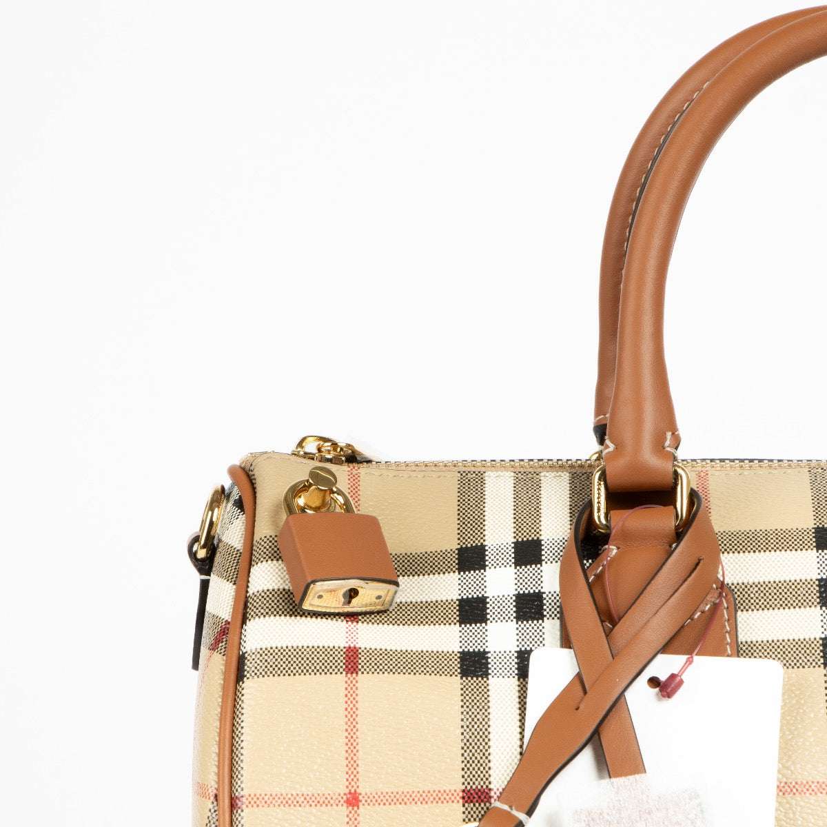 Authentic pre-loved Burberry Beige Canvas Medium Bowling Top Handle Bag on Labellov.com