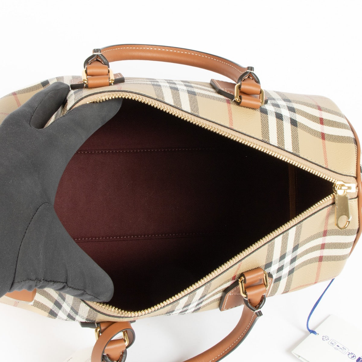 Authentic pre-loved Burberry Beige Canvas Medium Bowling Top Handle Bag on Labellov.com